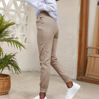 Women's High-Waisted Slim-Fit Pants With Slant Pockets & Button Detail Work & Casual Trousers